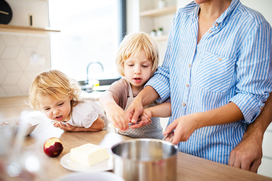 children helping mom in the kitchen